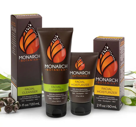 Monarch Botanika facial cleanser and moisturizer with their boxes, made with cold-pressed milkweed seed oil